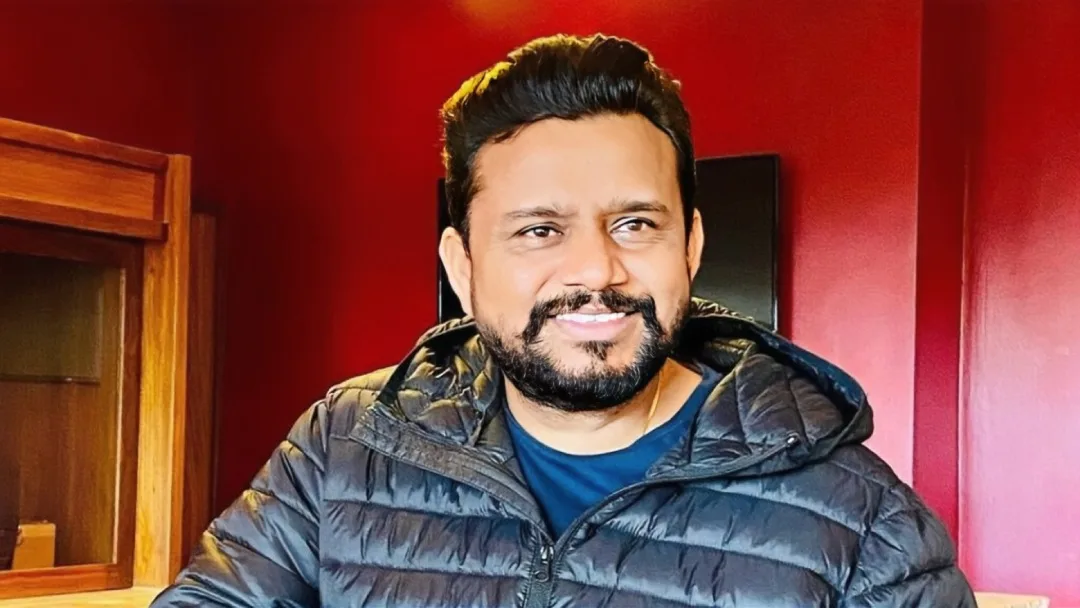 karamjit anmol wearing black jacket