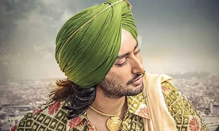 satinder sartaj wearing green turban and green embroidery kurta