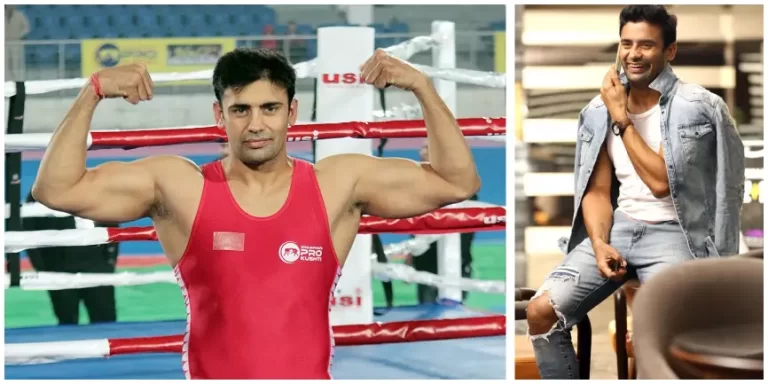 sangram singh wearing his red wrestling suit representing India